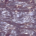 Seamless texture of crumpled metalllic foil as background