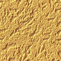 Fragment of an beige relief wall