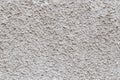seamless texture and full frame background of rough grey plaster finish of an outdoor building wall Royalty Free Stock Photo