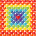 Seamless texture of hearts painted rainbow colors.