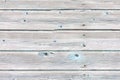 Seamless texture of an old plank wall made of old peeling boards