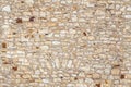 Seamless texture of old stone beige wall Royalty Free Stock Photo