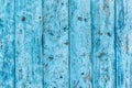 Seamless texture of old wooden fence with blue peeling paint, abstract plank background Royalty Free Stock Photo