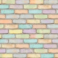 Seamless texture pattern featuring distressed, multicolored brick wall surface with pastel shades and weathered grout lines Royalty Free Stock Photo