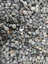 Seamless Texture of Small Gravel Stones Creating a Dark and Textured Background Royalty Free Stock Photo
