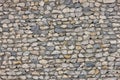 seamless texture of ugly sharp stone wall with concrete between rocks Royalty Free Stock Photo