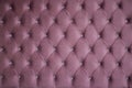 seamless texture of velvety purple fabric on upholstered furniture with glass crystals close-up, without people Royalty Free Stock Photo