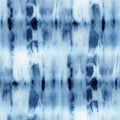 Seamless tie-dye pattern of indigo color on white silk.