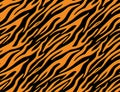 seamless tiger and zebra stripes animal skin pattern. Orange black texture for textile fabric print. Royalty Free Stock Photo