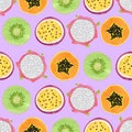 Seamless tropical fruit pattern with kiwi, papaya and passion fruit slices Royalty Free Stock Photo