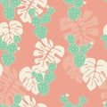 Seamless tropical pattern with monstera palm leaves, and cactus on pink background Royalty Free Stock Photo