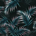 Seamless tropical pattern, vivid tropic foliage, with dark and pink palm leaves. Royalty Free Stock Photo