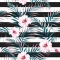 Seamless tropical pattern, vivid tropic foliage, with pink palm leaves and hibiscus flowers.