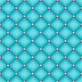 Seamless turquoise quilted background with pins. Royalty Free Stock Photo