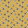 Seamless vector abstract pattern with little squares sccattered on a mustard yellow background Royalty Free Stock Photo