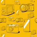 Seamless vector background with cameras Royalty Free Stock Photo