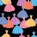 Seamless vector background of silhouettes colorful female dresses