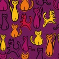 Seamless vector pattern with colorful cats on purple background