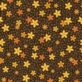 Seamless vector floral pattern with abstract small flowers and leaves in yellow colors on black background. Ditsy print
