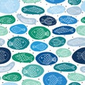 Seamless vector kids pattern fishes in blue and green bubbles. Marine children summer background on polka dots Royalty Free Stock Photo