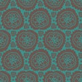 Seamless vector pattern with abstract lacy shapes in teal and brown