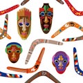 Seamless vector pattern with Australian boomerangs and African masks. Royalty Free Stock Photo