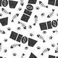 Seamless vector pattern with black and white cat paws, fish bones and lettering meow on white background. Cat lover design for Royalty Free Stock Photo