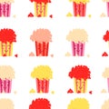 Seamless vector pattern of colored buckets popcorn. Cheerful popcorn print. Delicious sweet snack. Nice popcorn. The pattern for Royalty Free Stock Photo