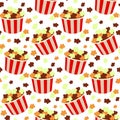 Seamless vector pattern of colored popcorn buckets on a white background. Funny print with the image of popcorn in retro Royalty Free Stock Photo