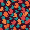 Seamless vector pattern with colorful butterflies silhouettes on dark background Royalty Free Stock Photo