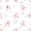 Seamless vector pattern with cute pomeranian puppies and hearts.