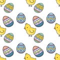 A seamless vector pattern featuring adorable yellow chicks and vibrantly decorated Easter eggs Royalty Free Stock Photo