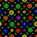 Seamless vector pattern - flowers of rainbow colors surrounded by green leaves on a black background Royalty Free Stock Photo