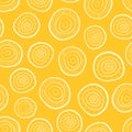 Seamless vector pattern hand drawn circles on yellow. Abstract gold yellow doodle background. Repeating pattern with