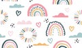 Seamless vector pattern with hand drawn rainbows and sun. Trendy baby texture Royalty Free Stock Photo