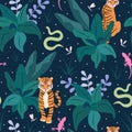 seamless vector pattern illustration with tigers, colorful plants and leaves, green snake on blue background Royalty Free Stock Photo