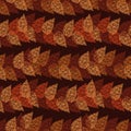 Seamless vector pattern with orange and red autumn leaves forming horizontal stripes on dark background Royalty Free Stock Photo