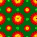 Seamless vector pattern - stylized dahlia flowers in bright red and yellow tones on a green background Royalty Free Stock Photo