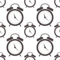 Seamless vector pattern. Symmetrical background with closeup black alarm clocks on the white background
