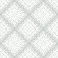 Seamless vector pattern. Symmetrical geometric background with grey rhombus and circles on the white backdrop. Decorative ornament