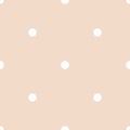 Seamless vector pattern with white polka dots on a tile pastel pink background Royalty Free Stock Photo