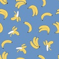 Seamless vector pattern of yellow cartoon bananas on a blue background Royalty Free Stock Photo