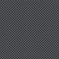 Seamless vector wallpaper of perforated gray metal plate. Royalty Free Stock Photo