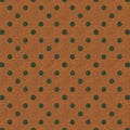 Seamless vintage background texture featuring a repeating pattern of dark green polka dots overlaying a distressed rustic orange Royalty Free Stock Photo