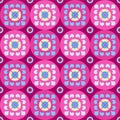 Seamless violet pattern with flowers in the circles.