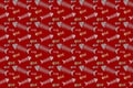 Seamless wallpaper with cute pattern, herringbone pattern, dark red background Royalty Free Stock Photo