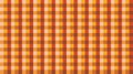 A seamless, warm orange, yellow, and brown checkered pattern. This classic gingham or plaid design Royalty Free Stock Photo