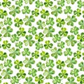 Seamless watercolor background with trefoil clover leaves for Patrick day