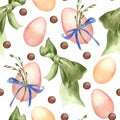 A seamless watercolor pattern featuring hand-drawn Easter eggs, chocolates, and tree branches with a blue and green bow. This hand Royalty Free Stock Photo