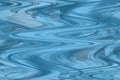 Seamless wavy pattern in blue tones. Turquoise and blue wavy stripes and lines, light golden spots.